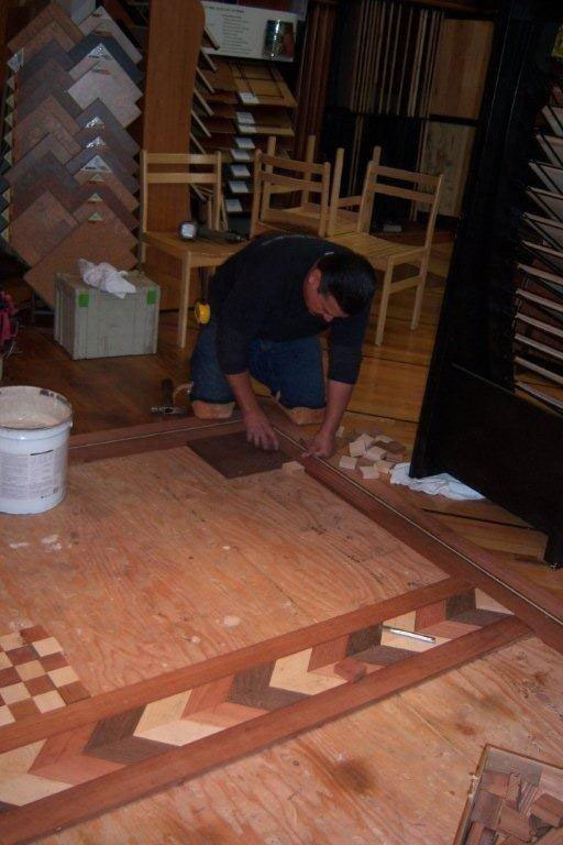 Fitting the border and first squares to the subfloor.