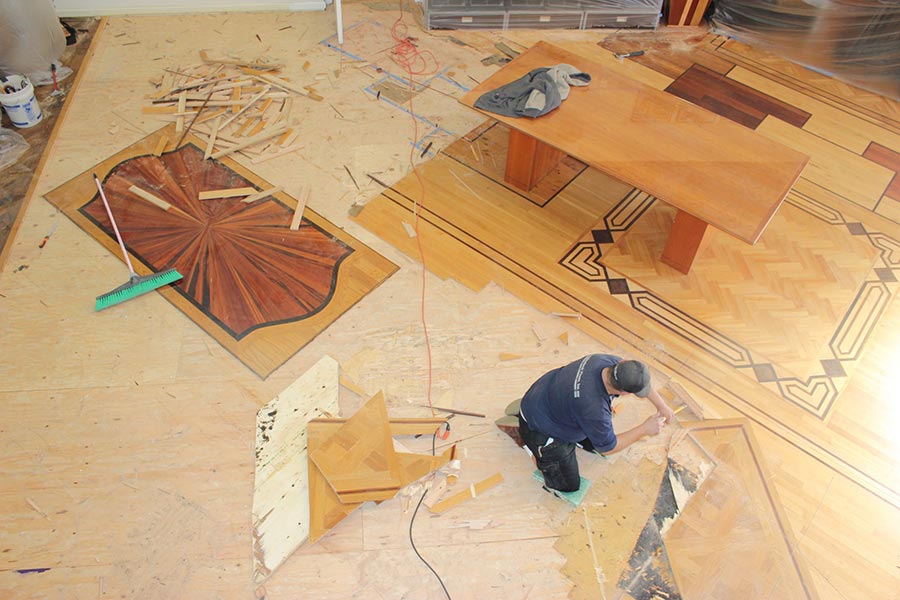 Pulling up the old hardwood flooring | Slaughterbeck Floors