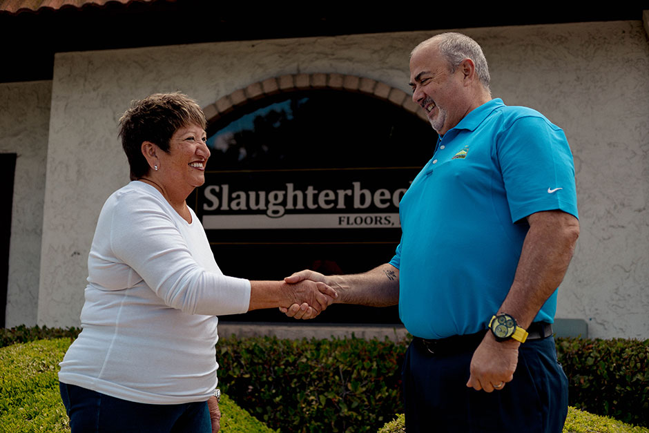 Joan Slaughterbeck and Paul Henthorn Handshake