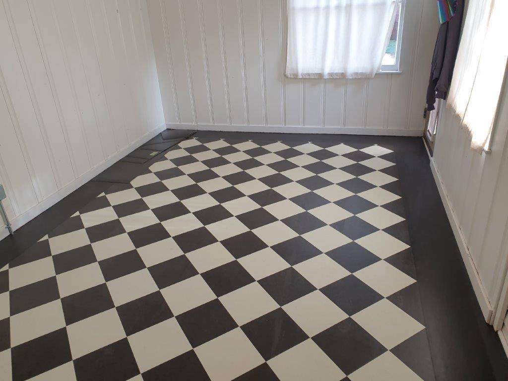 Marmoleum Black & White Checkerboard Floor Installed in Kitchen Nook of San Jose Home