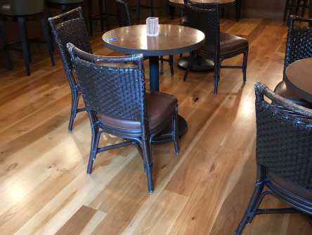 Refinished dining area hardwood flooring at Dio Deka Los Gatos