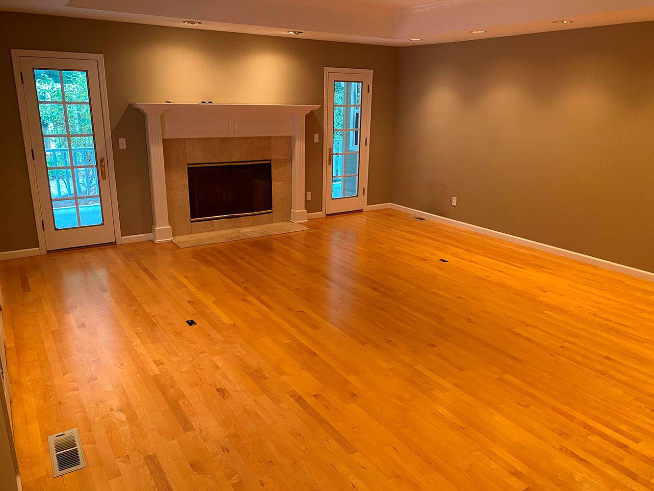 Living Room in Santa Cruz Home Before Hardwood Floor Restoration