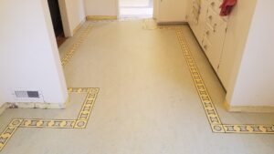 Custom border feature on linoleum floor side view