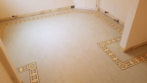 Custom border feature on linoleum floor