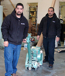 Two Slaughterbeck floors employees working in the showroom.