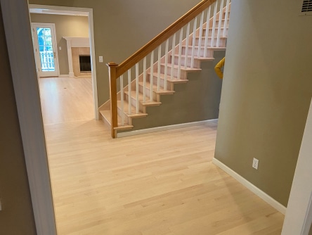 Open Stairwell with Rounded Bullnose and Wood Board Risers