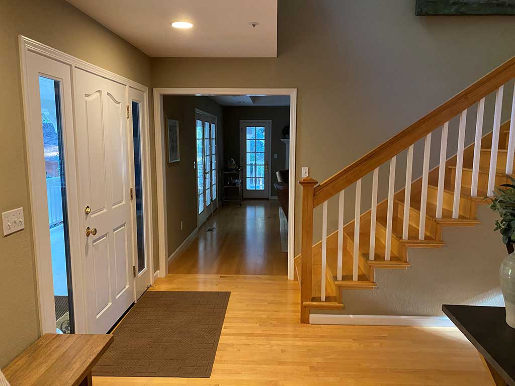 Staircase in Santa Cruz Home Before Hardwood Floor Restoration